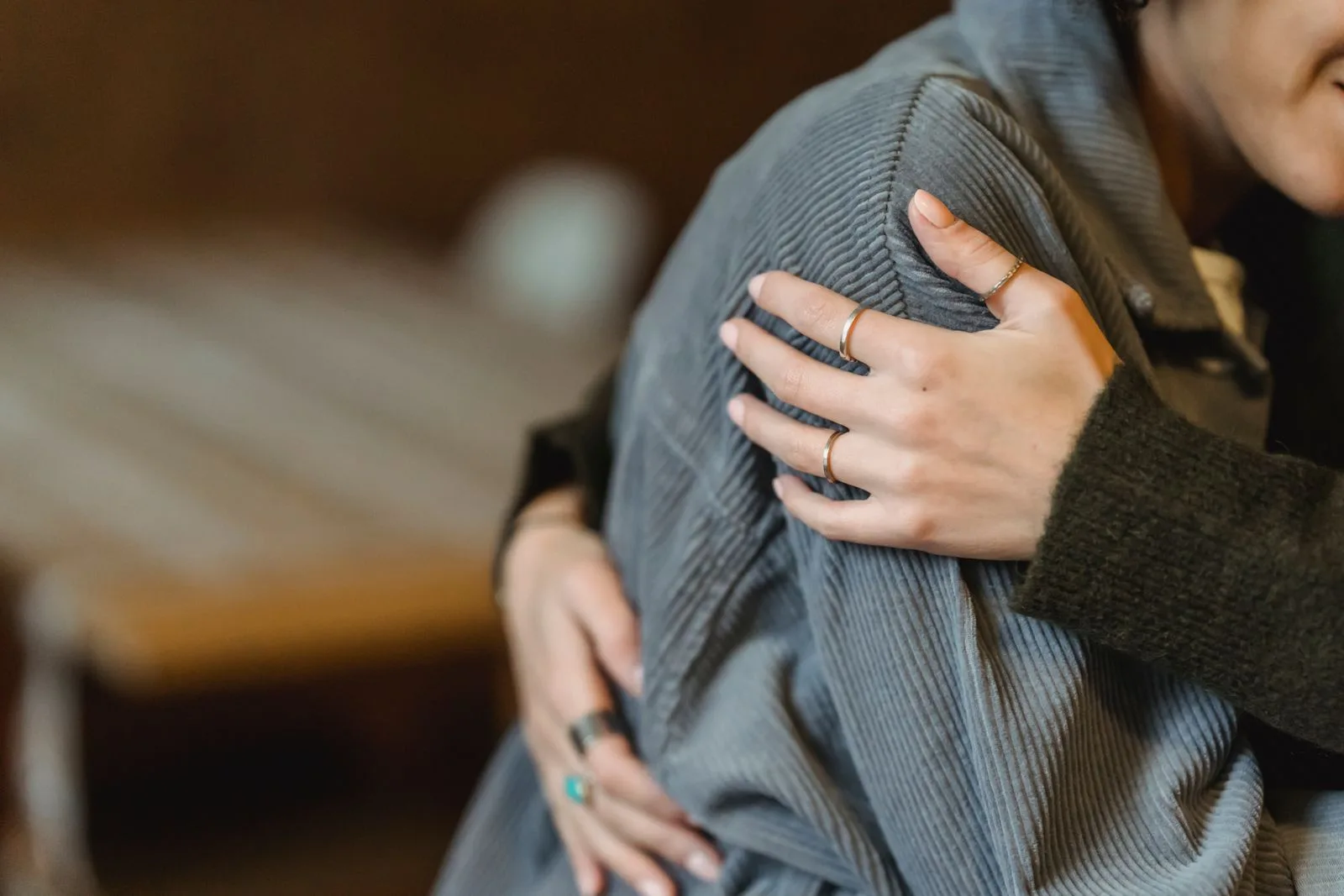 A comforting, reassuring embrace between two people
