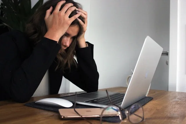 Person experiencing burnout and stress from prolonged mental pressure