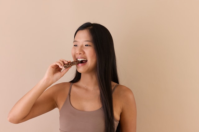 Person focusing on digestive health and gut wellbeing in a calm daily moment