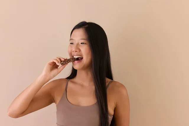 Person focusing on digestive health and gut wellbeing in a calm daily moment