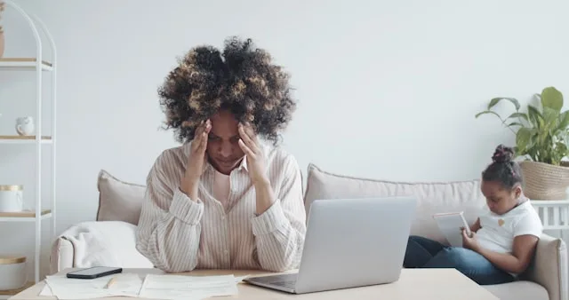 Person reflecting on family expectations and emotional pressure within the family
