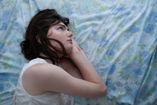 Person learning how to stop overthinking and calm the mind