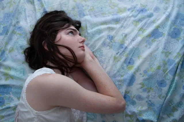 Person learning how to stop overthinking and calm the mind