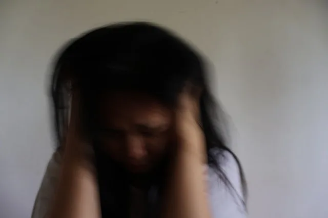 A young person overwhelmed — the pressures behind rising loneliness among Gen Z and young adults