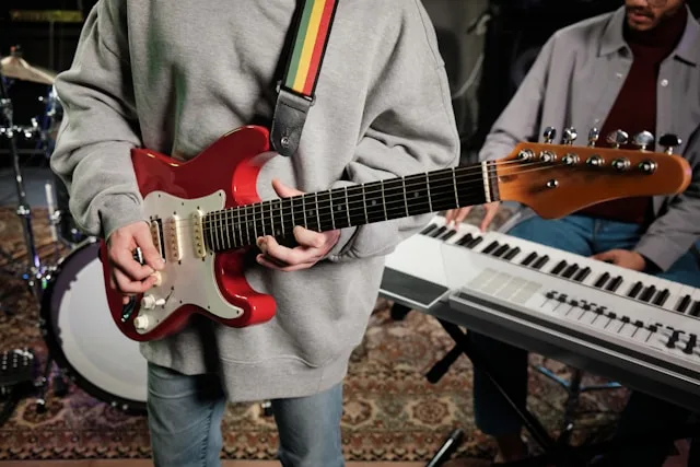 Person playing music and instruments as a form of creative and emotional expression