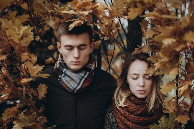 A couple standing close but looking uncertain — the ambiguity of the talking stage