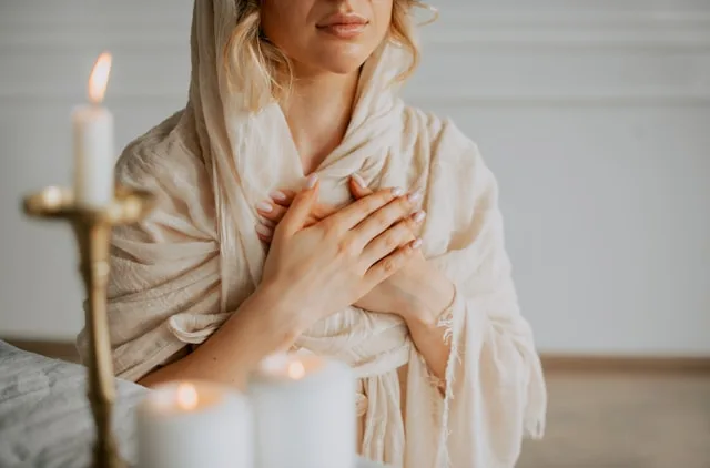 Person practicing self healing and restoring emotional balance through self care