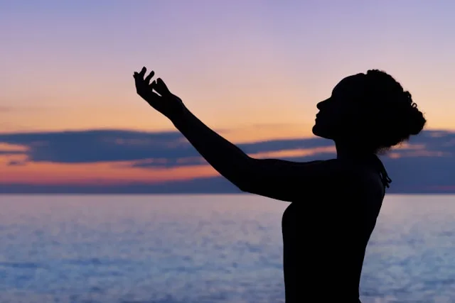 Person experiencing spiritual healing and emotional restoration