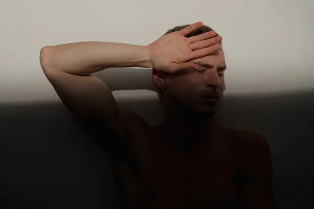 Person experiencing sudden loss and emotional shock after an unexpected event