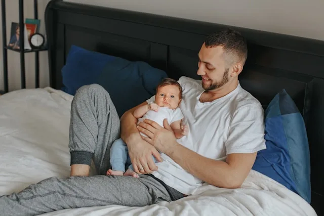 Person becoming a parent and adjusting to the emotional and life changes of parenthood