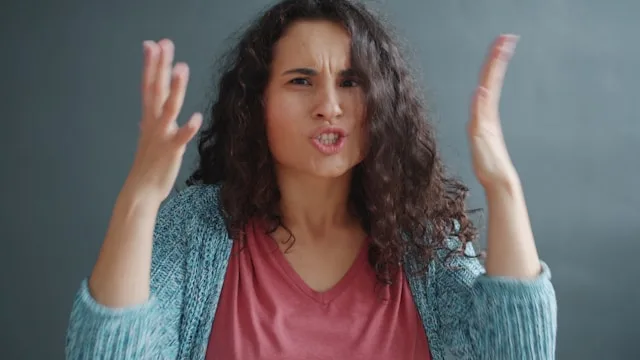 Person experiencing conflicting feelings and emotional inner conflict