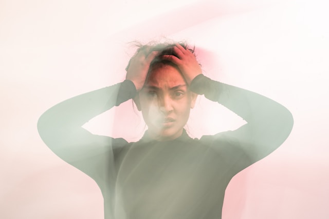 Person sitting alone experiencing general anxiety and persistent inner tension