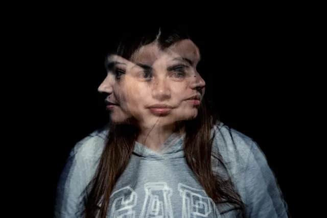 Person rebuilding identity after trauma and reconnecting with sense of self