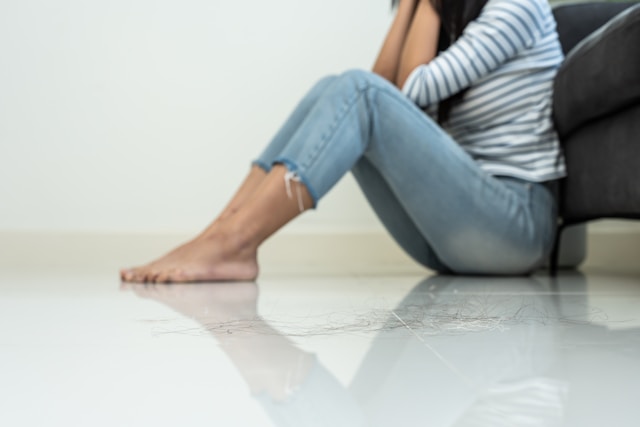 person navigating life after loss and gradually rebuilding meaning and stability