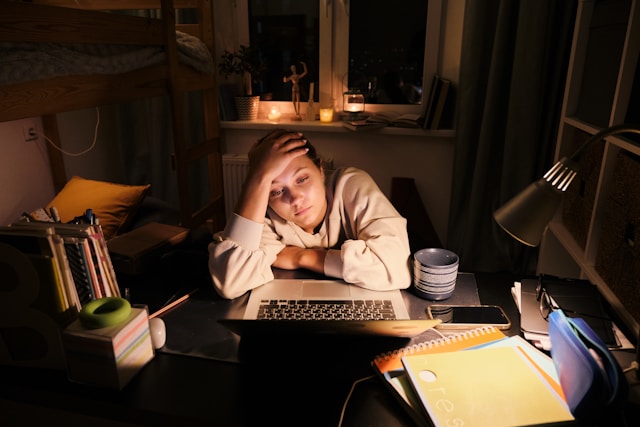 Person overthinking at night and unable to quiet the mind