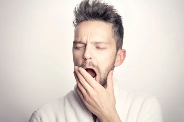 Person waking up anxious and feeling stressed at the start of the day